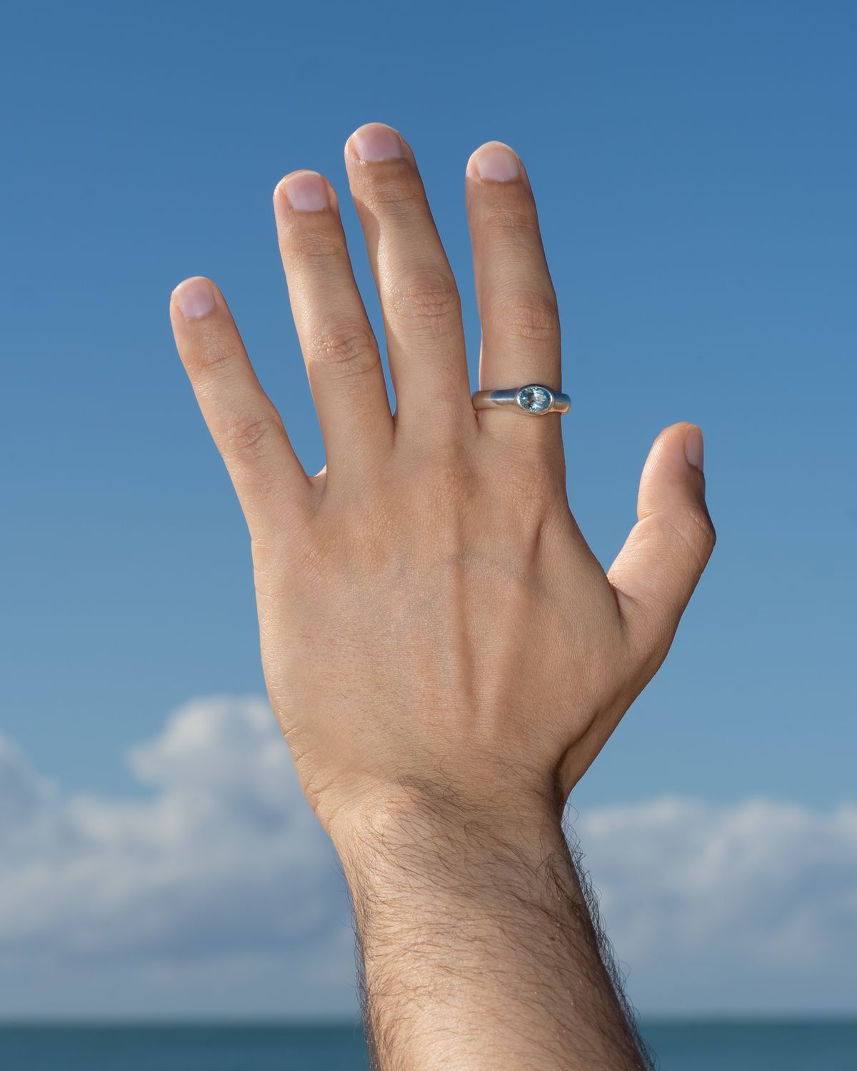 Deep Ring – Sky Blue Topaz – worn by a model – view 4